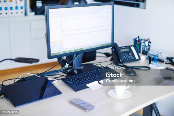 Office Desk With Equipment Stock Photo - Download Image Now - Desktop PC, Office, Computer