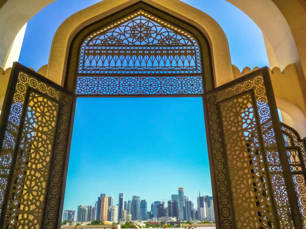 Doha Mosque entrance Modern skyscrapers of Doha West Bay skyline view from State Grand Mosque in Doha, Qatar, Middle East, Arabian Peninsula. Door of entrance at Mosque in Arabian style. grand mosque photos stock pictures, royalty-free photos & images