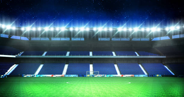 istock Empty seats football stadium background,3D rendering 1136984440