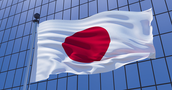 Flag of Japan on skyscraper building background. Business concept. 3d illustration
