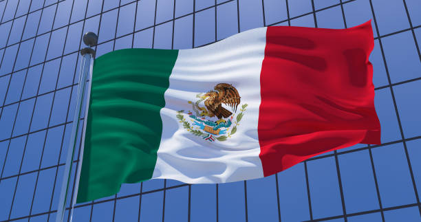 istock Mexico flag on skyscraper building background. 3d illustration 1136984526
