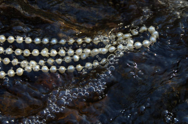 Necklace floating in water