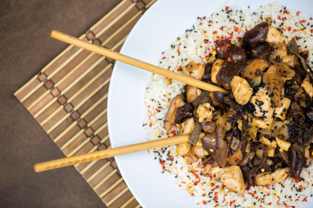 Rice with chicken and mushrooms. Asia food
