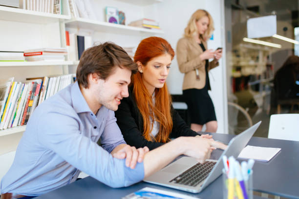 istock Businesspeople working in office 1136992970