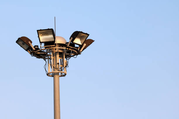 istock The stadium lights on poles with the sky. 1136994532