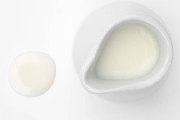 istock White jug of milk on white background viewed from above 1136997973