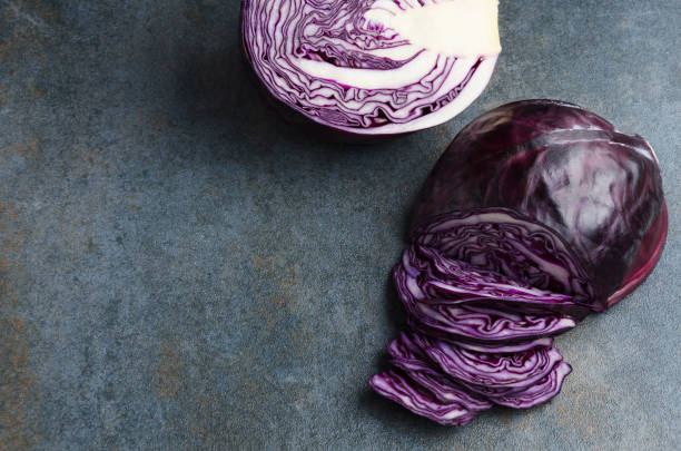 istock Process of chop of red cabbage on grey surface.Slaw cabbage 1136999500