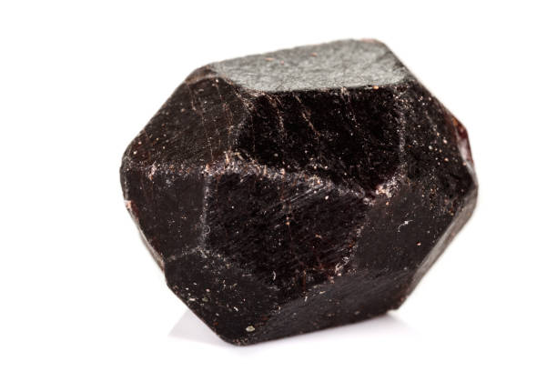 istock macro mineral stone  Garnet, on a white background 1137000510