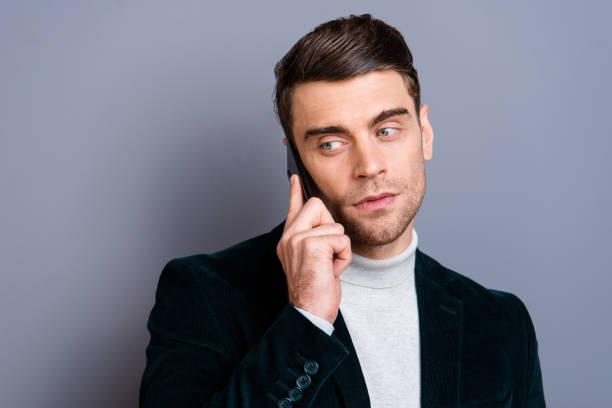 Close-up portrait of his he nice chic classy attractive handsome bearded content guy wearing velveteen blazer using new cellular device isolated over gray blue pastel background