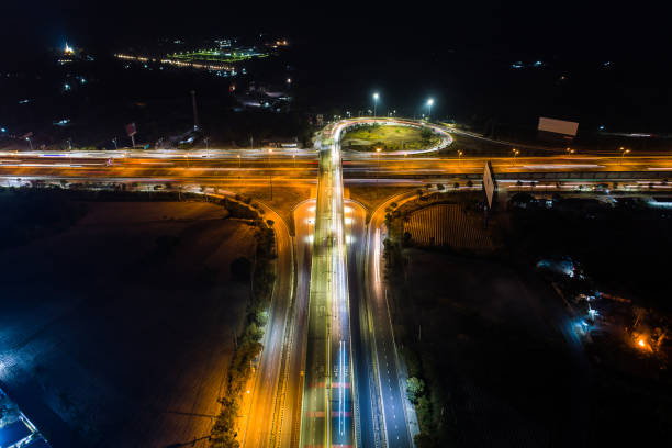 istock The light on the road roundabout at night Aerial view. 1137005805
