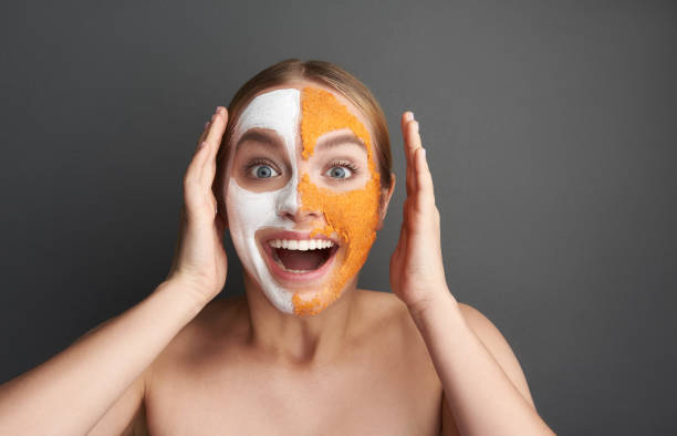 istock Excited woman smiling and putting her hands up 1137006309