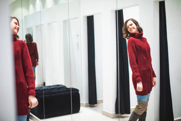 istock Woman in clothing store 1137006853
