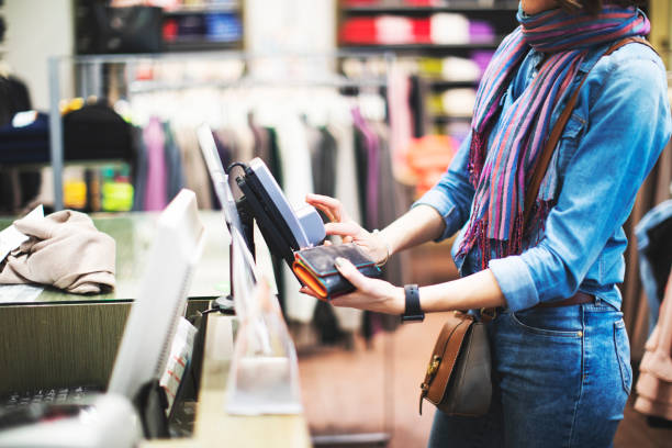 istock Woman in clothing store 1137006870
