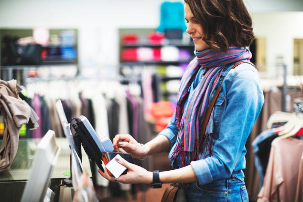 istock Woman in clothing store 1137006875