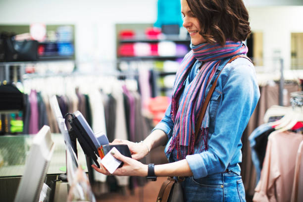 istock Woman in clothing store 1137006894