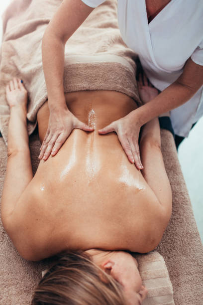istock Woman Enjoy Professional Back Massage 1137006924
