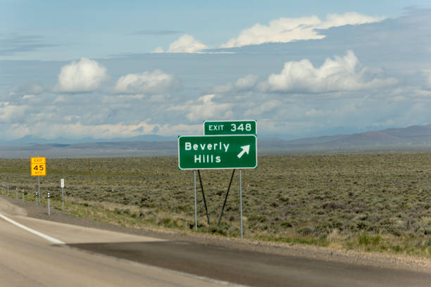 istock beverly hills exit traffic sign on highway between utah and nevada USA America 1137010056