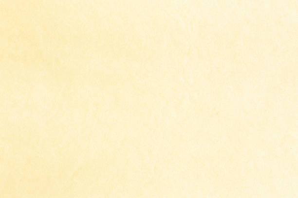 istock Old pale yellow with white stained background paper texture 1137010955