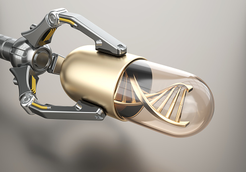 Robotic arm holds golden pill with DNA structure