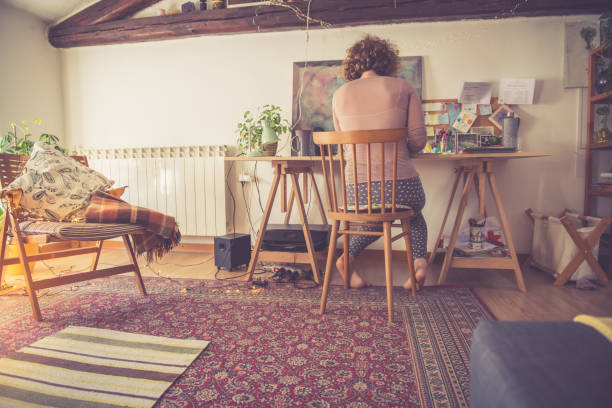 istock Young woman working from home 1137011263