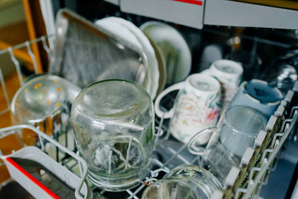 istock Washing Dishes in Dishwasher 1137011482