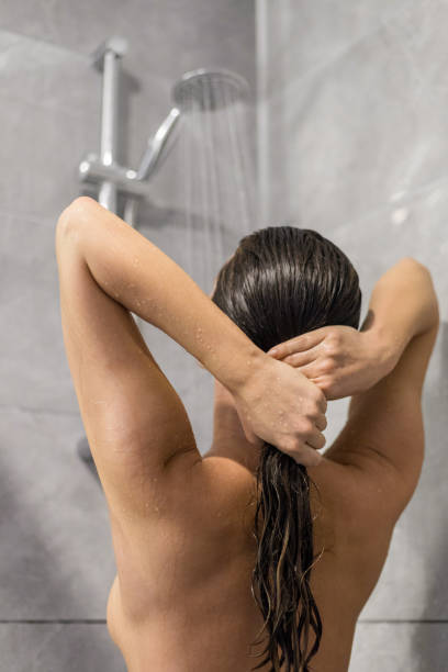 istock Woman take a shower 1137012834