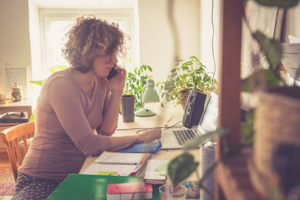istock Young woman working from home 1137013114