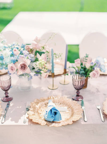 istock Table setting at a luxury wedding reception. Outdoor wedding 1137013599