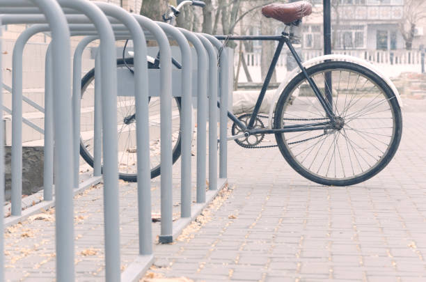 Single bicycle chained up at the bicycle rack