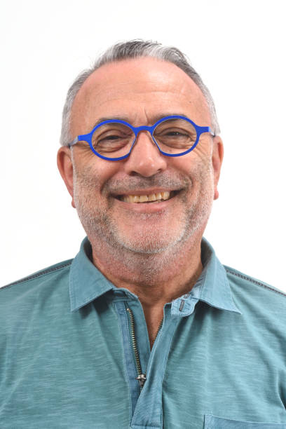istock portrait of senior man on white 1137015041