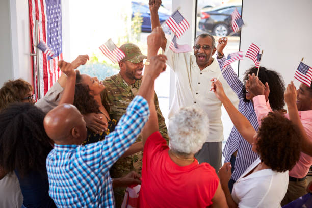 istock Multi generation Black family celebrating soldier returning home, elevated view 1137015159