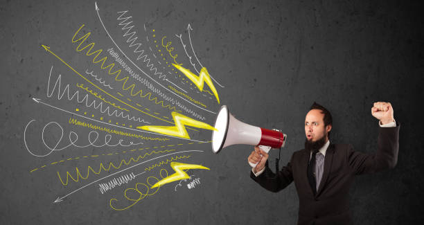 istock Leader guy shouting into megaphone with hand drawn lines and arrows 1137018356