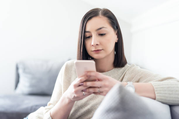 istock Young millennial girl texting 1137020190
