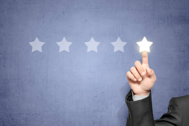 istock Business fingers choosing bright stars on virtual screen 1137021548