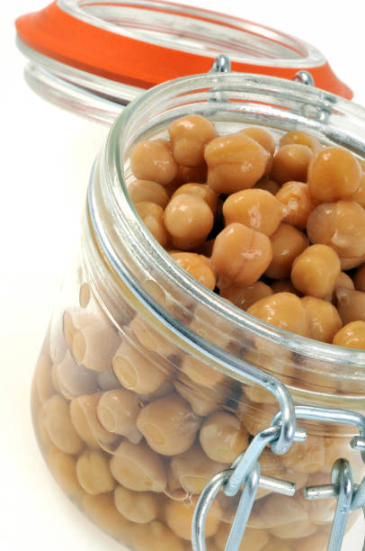 istock Chickpeas in a jar on a white background 1137022996