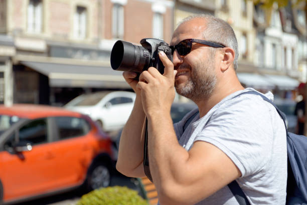 istock Man walks in France (with a camera) 1137024066