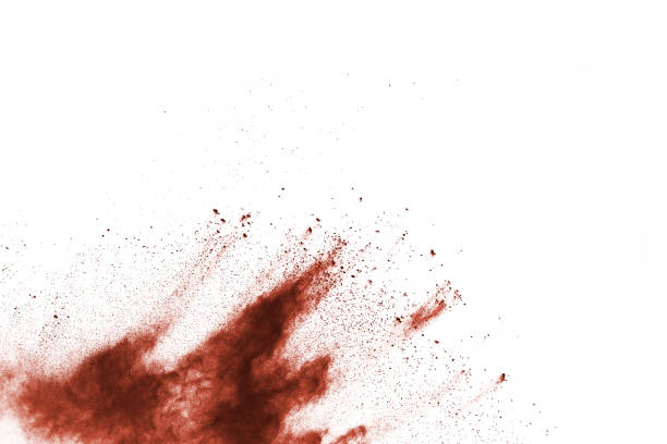istock Brown color powder explosion on white background. Colored cloud. Colorful dust explode. Paint Holi. 1137026952