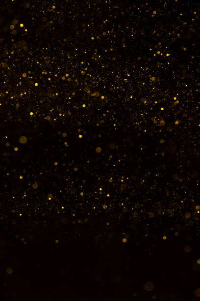 istock Gold glitter sparkle abstract vertical bokeh 1137028074