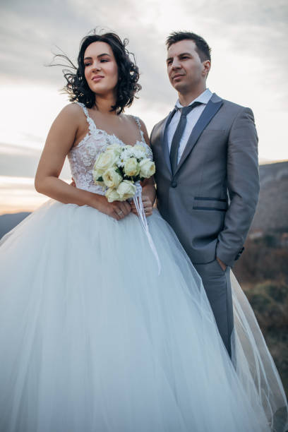 istock Young newlywed couple in nature 1137028991