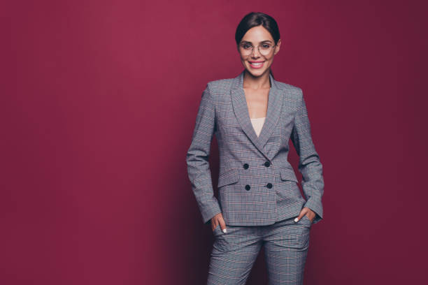 istock Portrait of her she nice classy pretty representative attractive cool cheerful cheery lady financier director wearing gray checkered suit isolated over maroon burgundy marsala pastel background 1137029096