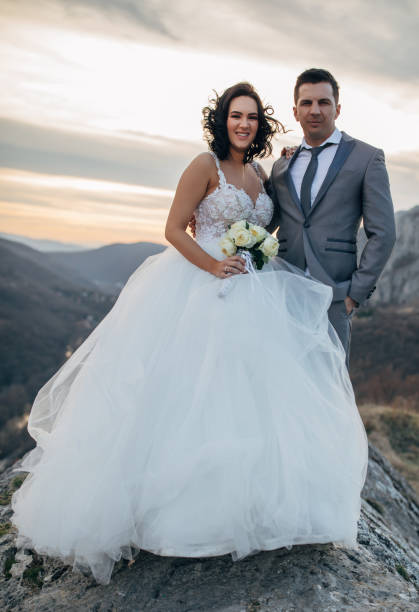 istock Newlywed couple on mountain 1137029932