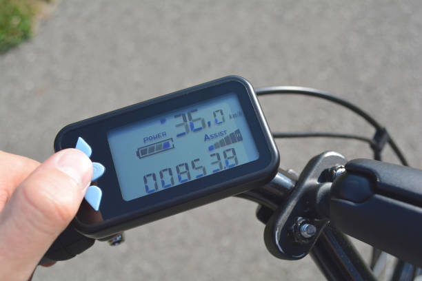 istock A male hand presses a button on a black electronic bicycle scooter. Bike computer installed on a bicycle's handlebar. Man pressing a button on e-bike control board. 1137032156