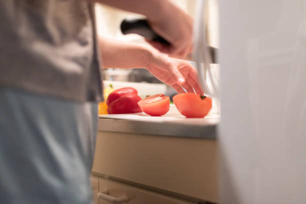 istock Woman preparing for breakfast in kitchen: Closeup of hands 1137032179