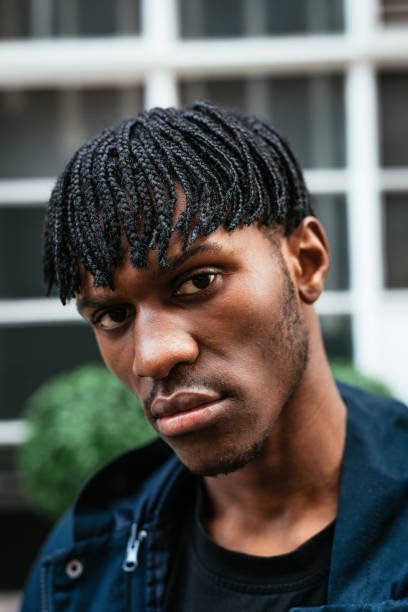 istock Young man in London with dreadlocks 1137032332