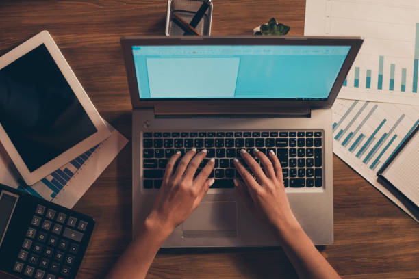 istock Cropped top above high angle view of feminine hands typing e-mail partner human journalism part time freelancer orders author blog blogger essay on table desk desktop 1137032800