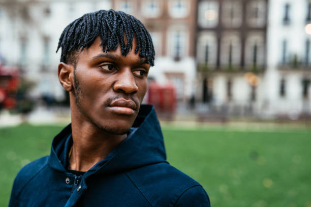 istock Young African Generation Z man in London with dreadlocks 1137033845