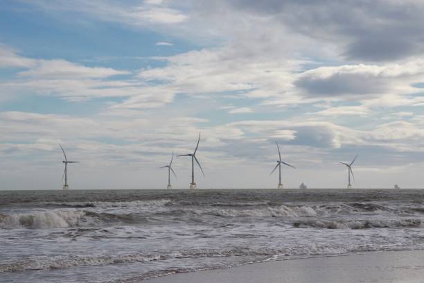 istock Wind turbines in sea 1137034359