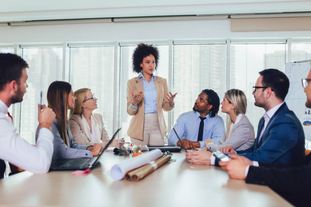 istock Group of young business people working together in creative office. 1137035292