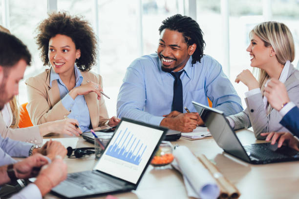 istock Group of young business people working together in creative office. 1137035346