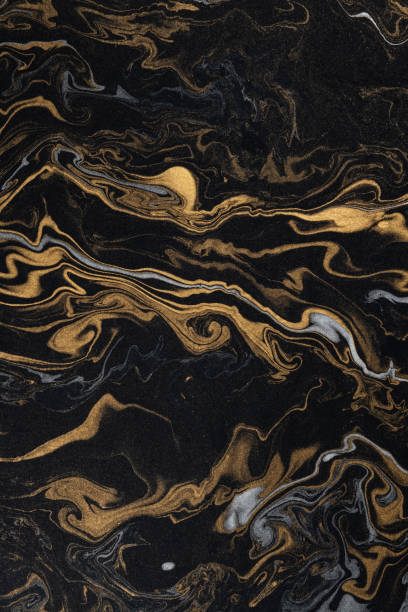 istock marble ink paper texture black silver gold 1137035428